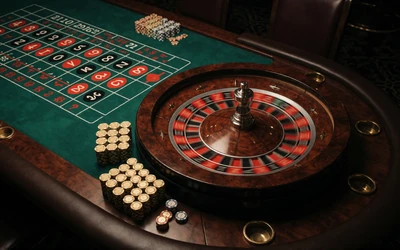 Live Casino Roulette-Tisch mit gr&uuml;nem Filz bei WildRobin Casino